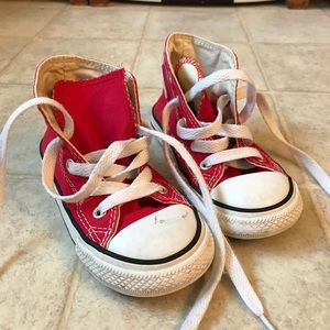 Red converse high tops